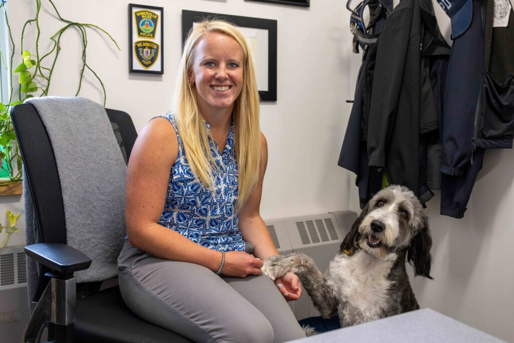 The Wilmington Mental Health Coordinator with the department therapy dog.